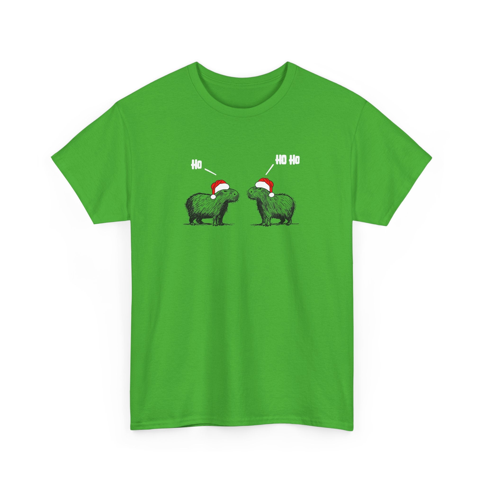 A bright green short-sleeve crewneck t-shirt featuring a graphic of two green capybara animals wearing red Santa hats, with white text above them, displayed on a clean white background.