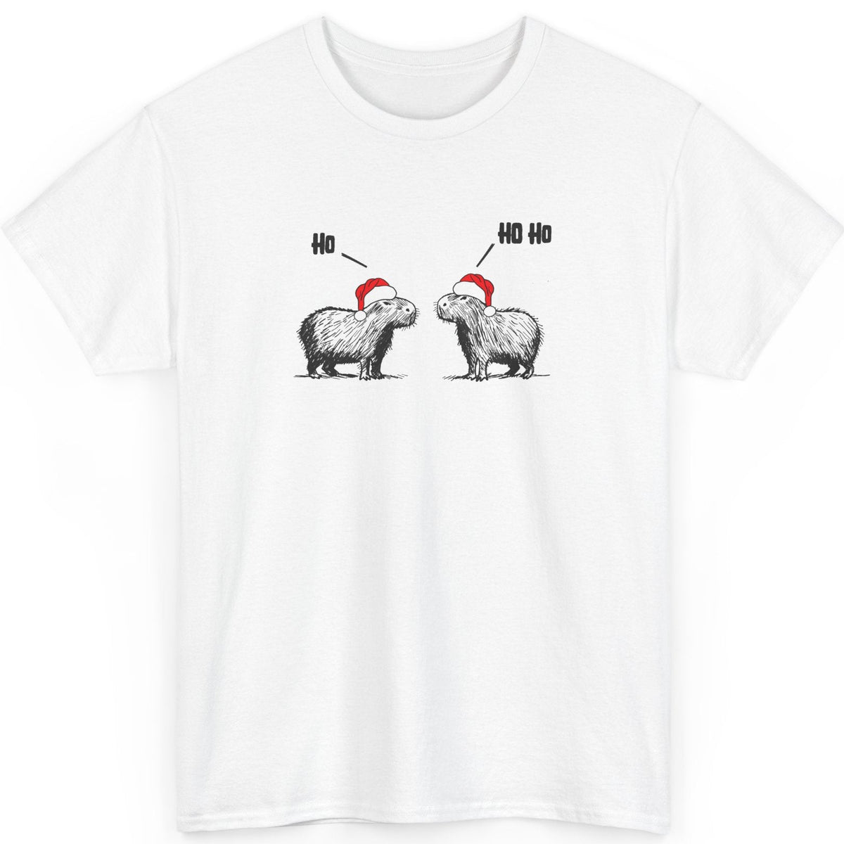 A white short-sleeve crewneck t-shirt featuring a graphic of two fluffy capybara wearing red Santa hats, with 'Ho Ho Ho' text above them, displayed on a clean white background.