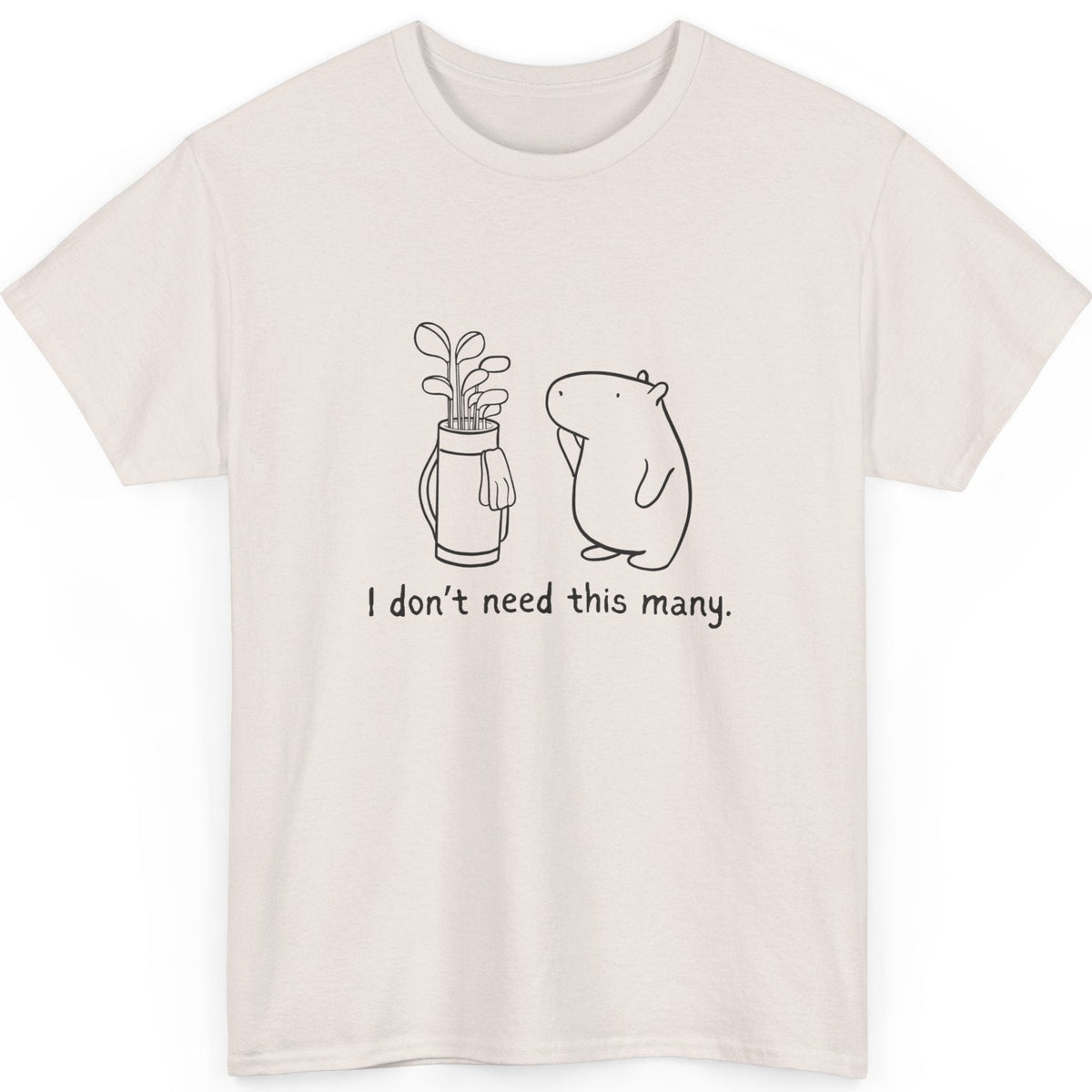 Beige t-shirt with a graphic of a capybara and golf clubs with text 'I don't need this many' on a white background
