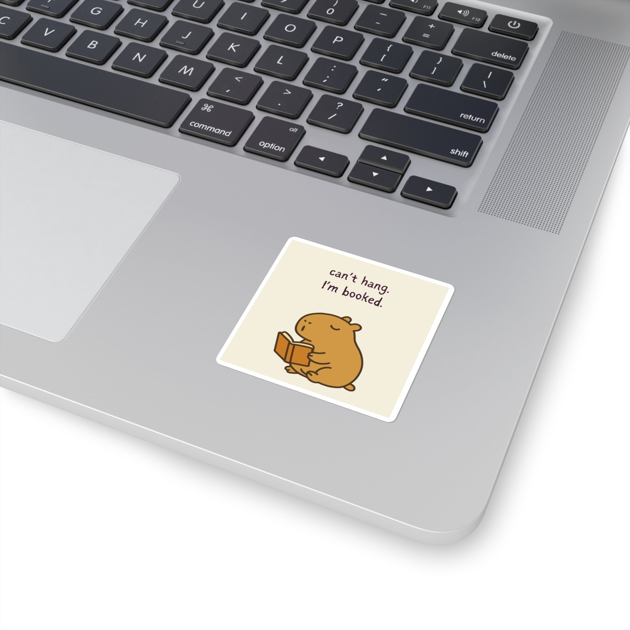 Can’t Hang, I’m Booked Sticker – Cozy Capybara Reading Vinyl Sticker for Laptops & Journals