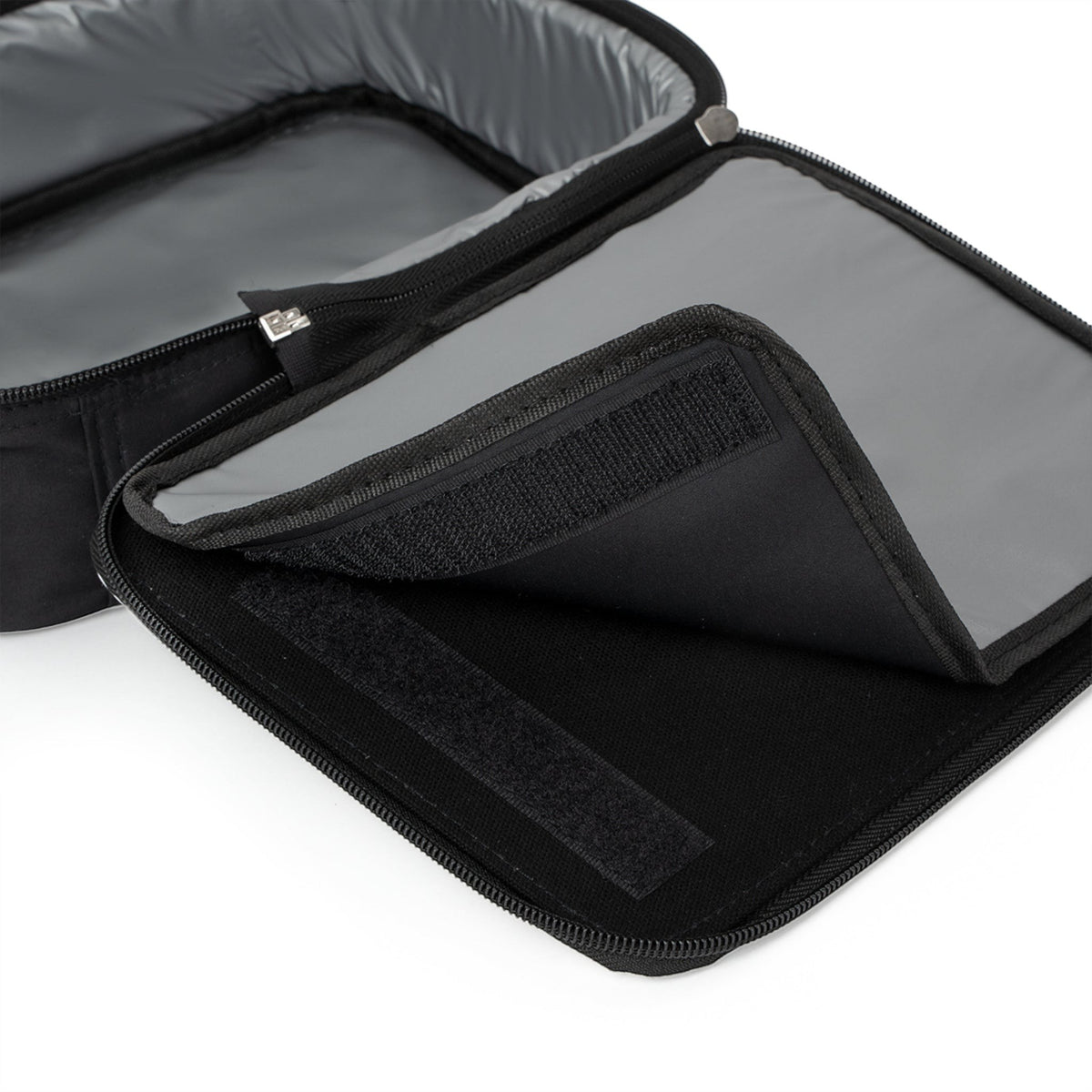 Capy Life black insulated kids lunchbox with grey interior lining and velcro closure detail
