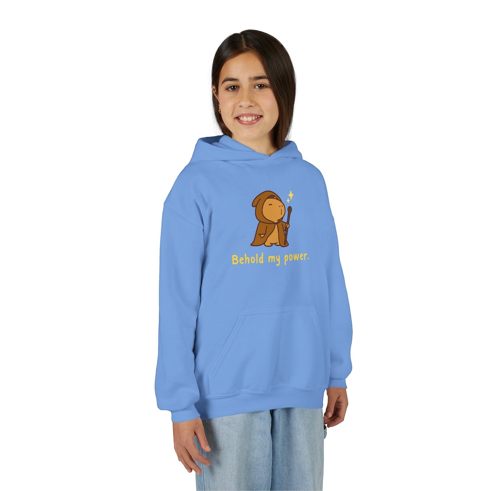 Capy Life kids blue pullover hoodie featuring a cute wizard capybara graphic with the text Behold my power
