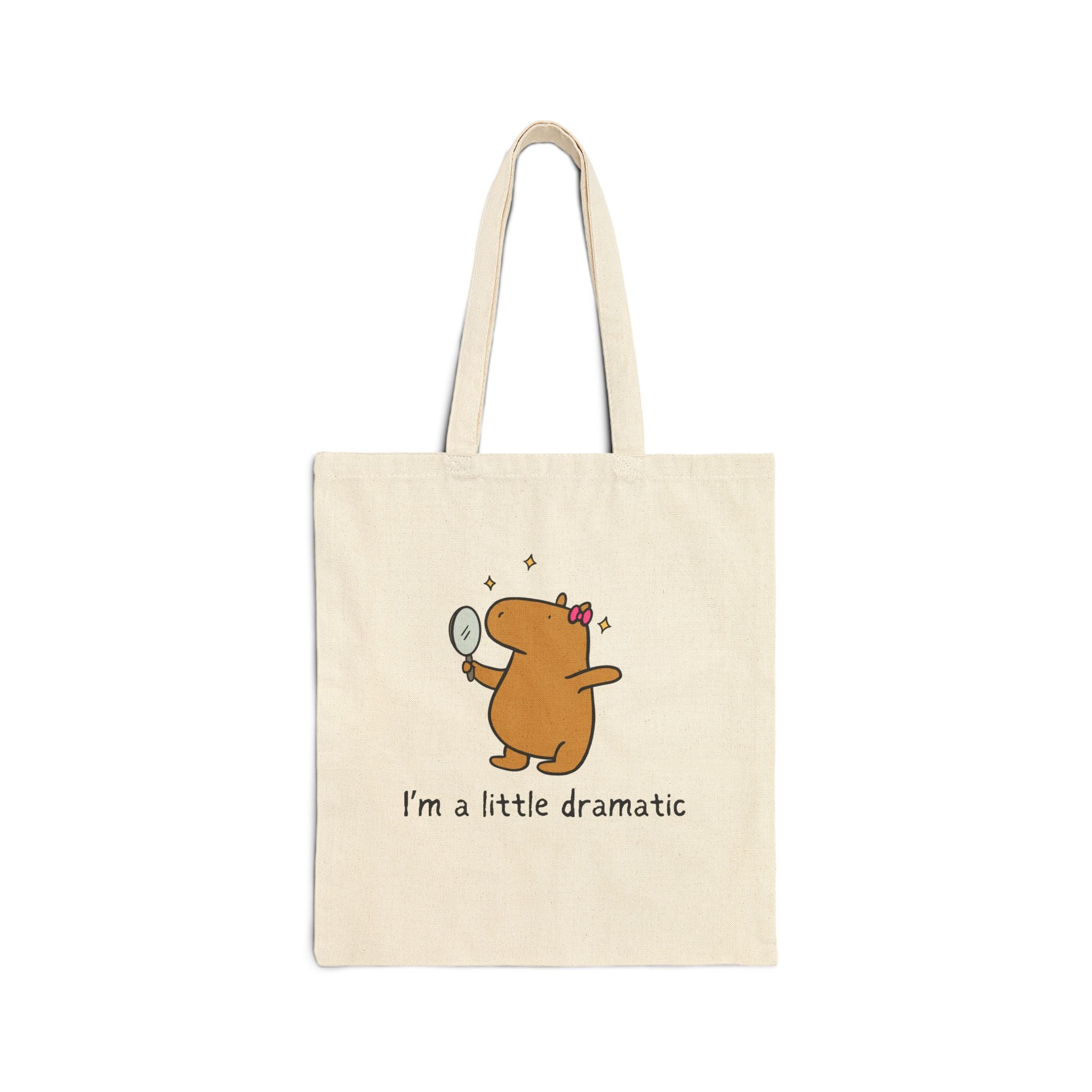 Capy Life natural cotton canvas tote bag featuring a cute capybara holding a mirror with the text I am a little dramatic