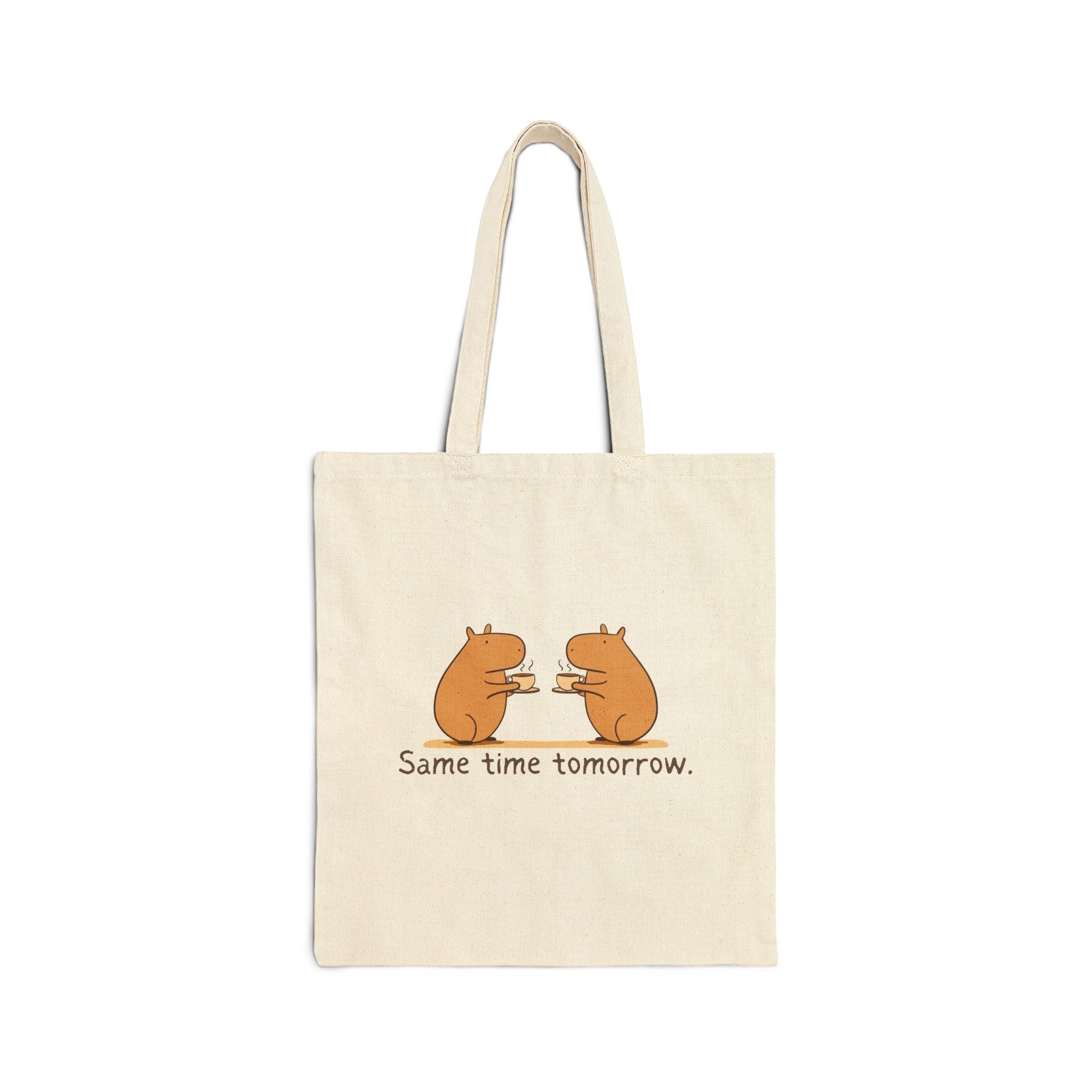 Capy Life natural cotton canvas tote bag featuring a hand-drawn illustration of two capybaras sharing coffee.