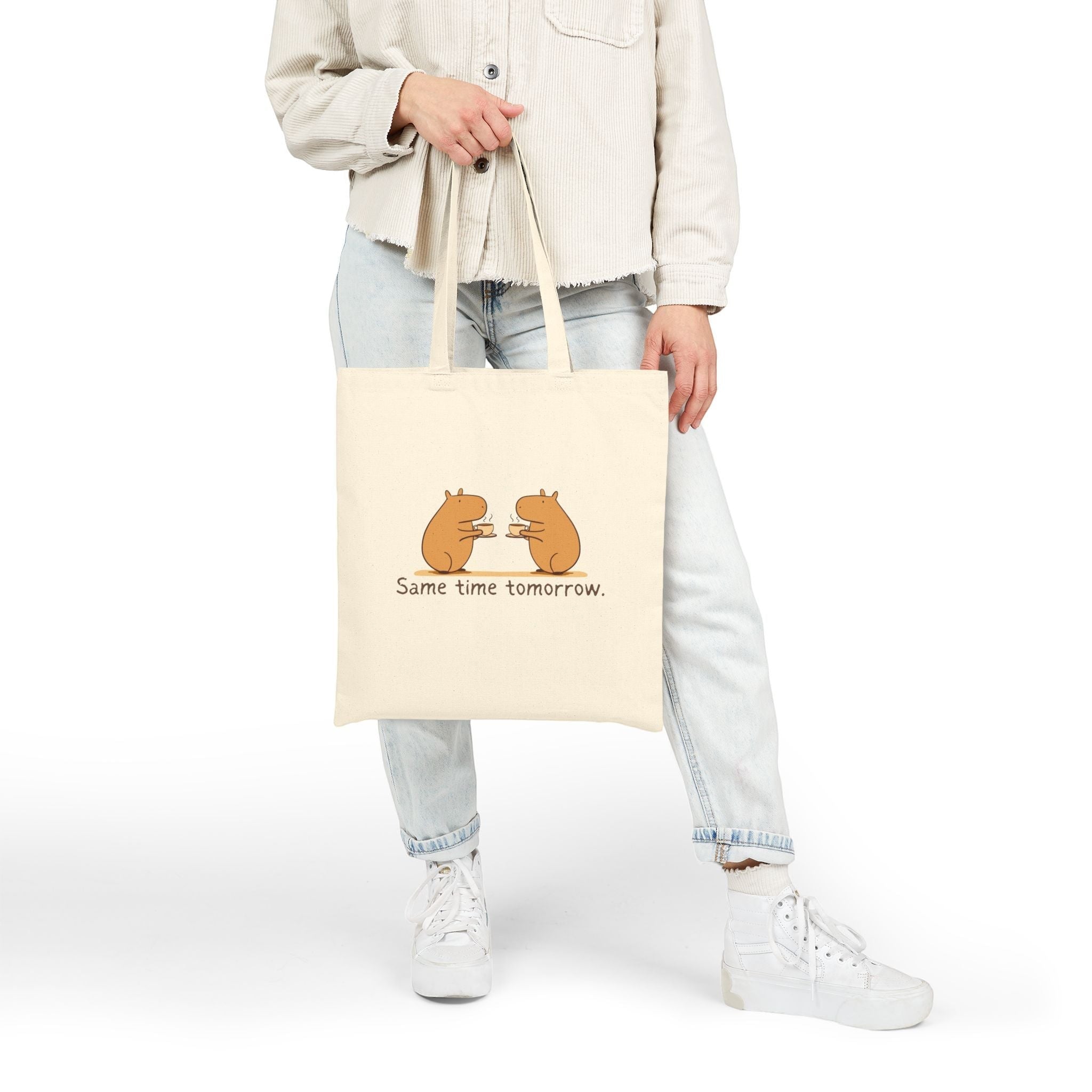 Capy Life natural cotton canvas tote bag featuring a hand-drawn illustration of two capybaras sharing coffee.