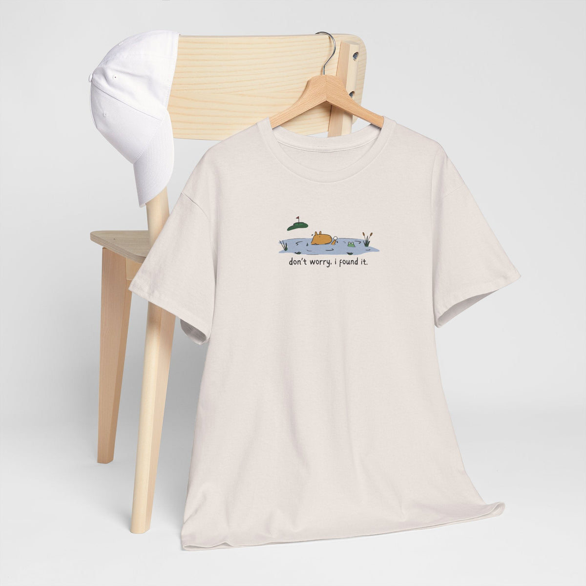 Capy Life heavy cotton t-shirt in cream featuring a capybara in a water hazard with the text don’t worry. i found it.