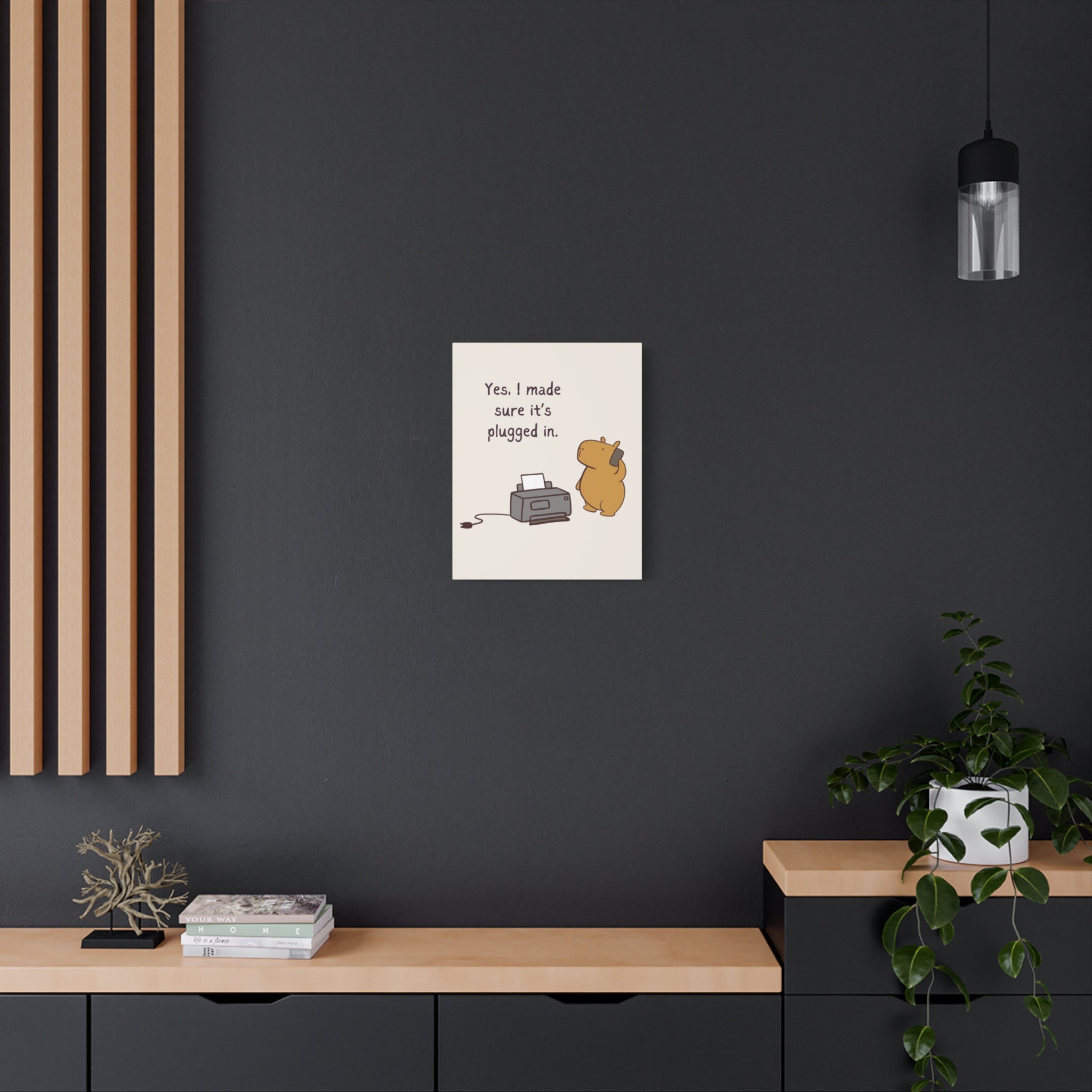 Capy Life canvas wall art featuring a cute capybara with a printer and funny IT tech support quote on a dark office wall
