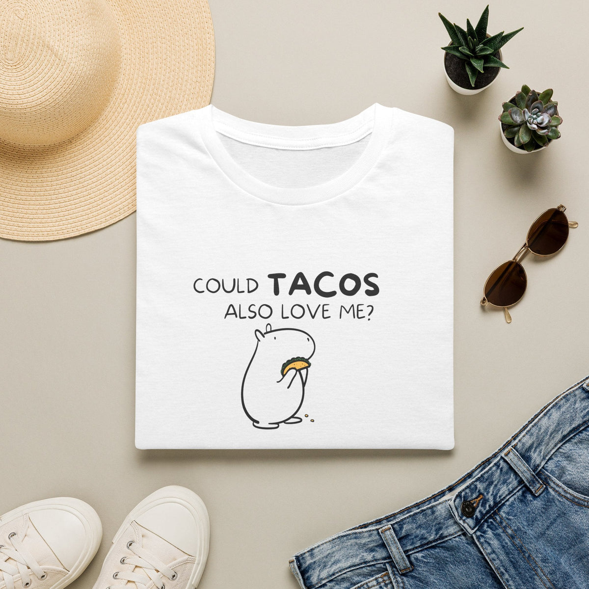 Capy Life white crewneck t-shirt featuring a minimalist black line art illustration of a capybara holding a taco.