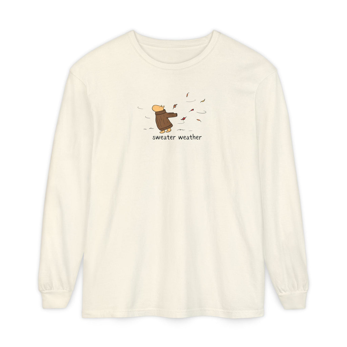 Capy Life long sleeve cream t-shirt featuring a cute capybara in a brown sweater with autumn leaves and text.