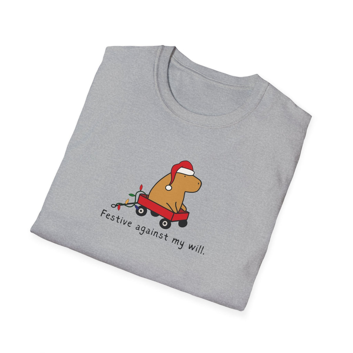 Capy Life grey t-shirt featuring a cartoon capybara in a Santa hat and red wagon with the text Festive against my will.