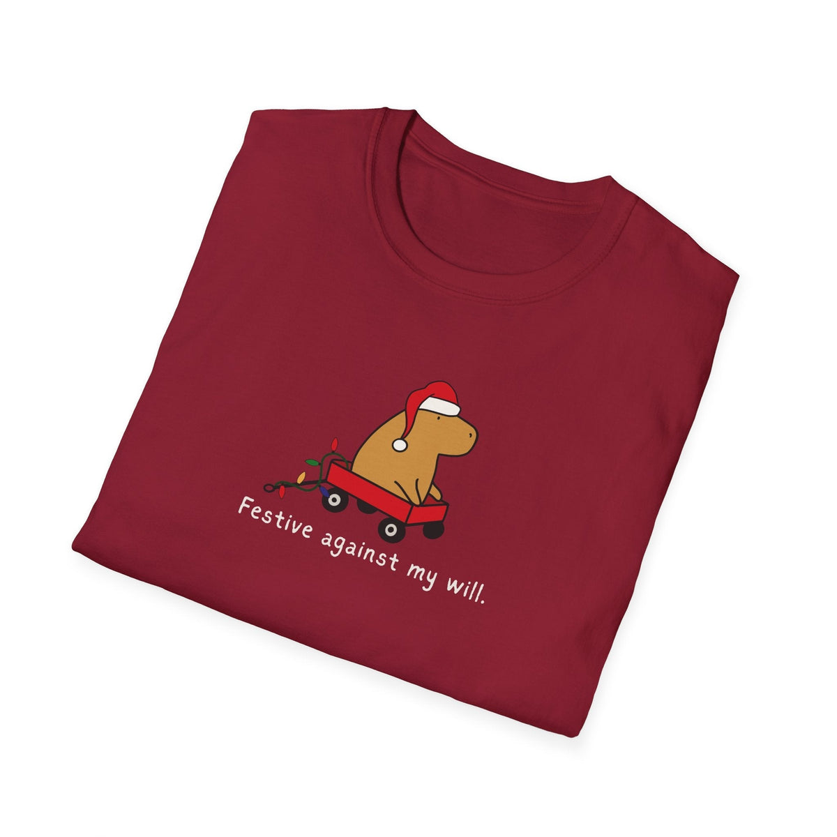 Capy Life red softstyle t-shirt featuring a cartoon capybara in a Santa hat and red wagon with Christmas lights