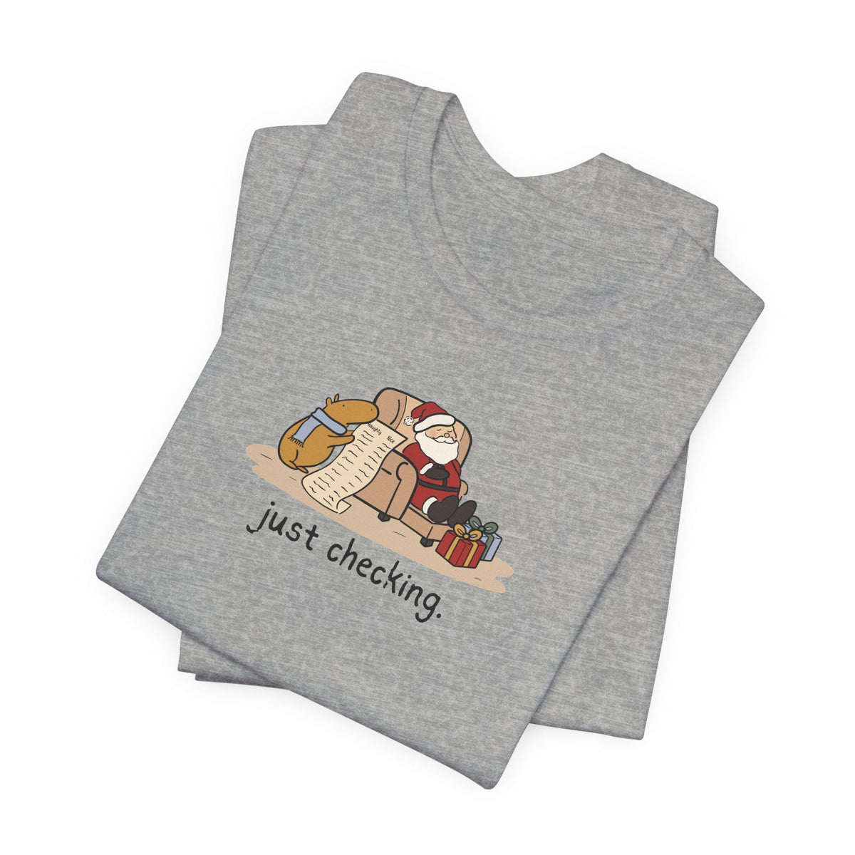 Capy Life grey softstyle t-shirt featuring a hand-drawn capybara checking Santa's naughty or nice list.