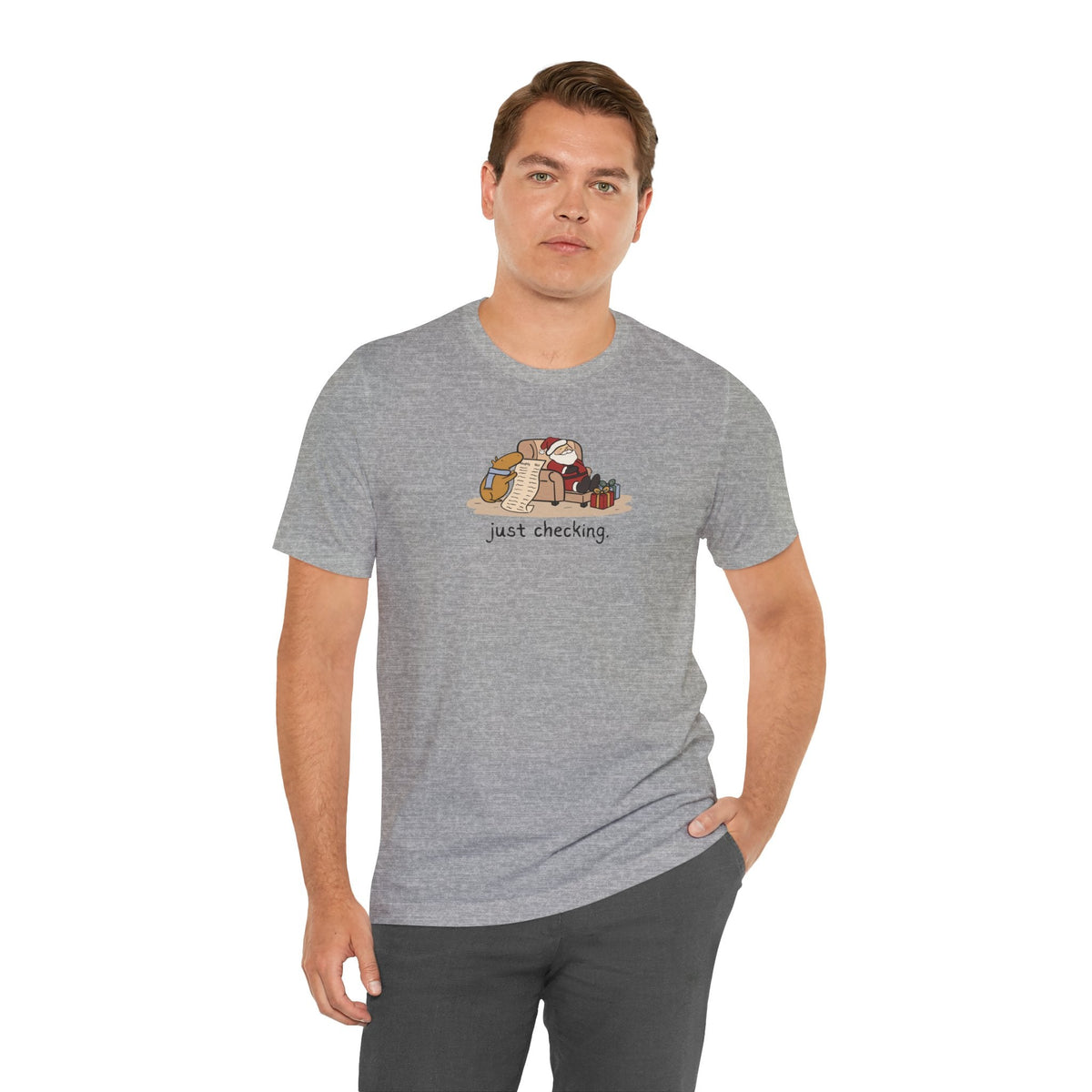Capy Life grey t-shirt featuring a hand-drawn illustration of a capybara checking Santa's naughty or nice list.