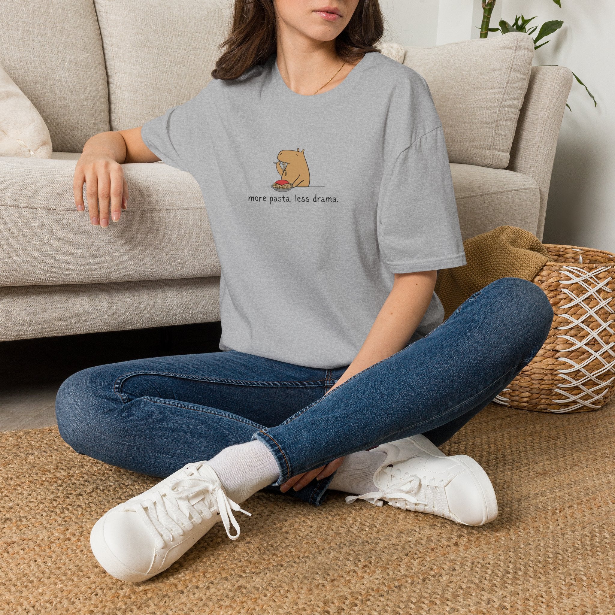 Capy Life grey t-shirt featuring a minimalist capybara eating pasta with the text more pasta less drama