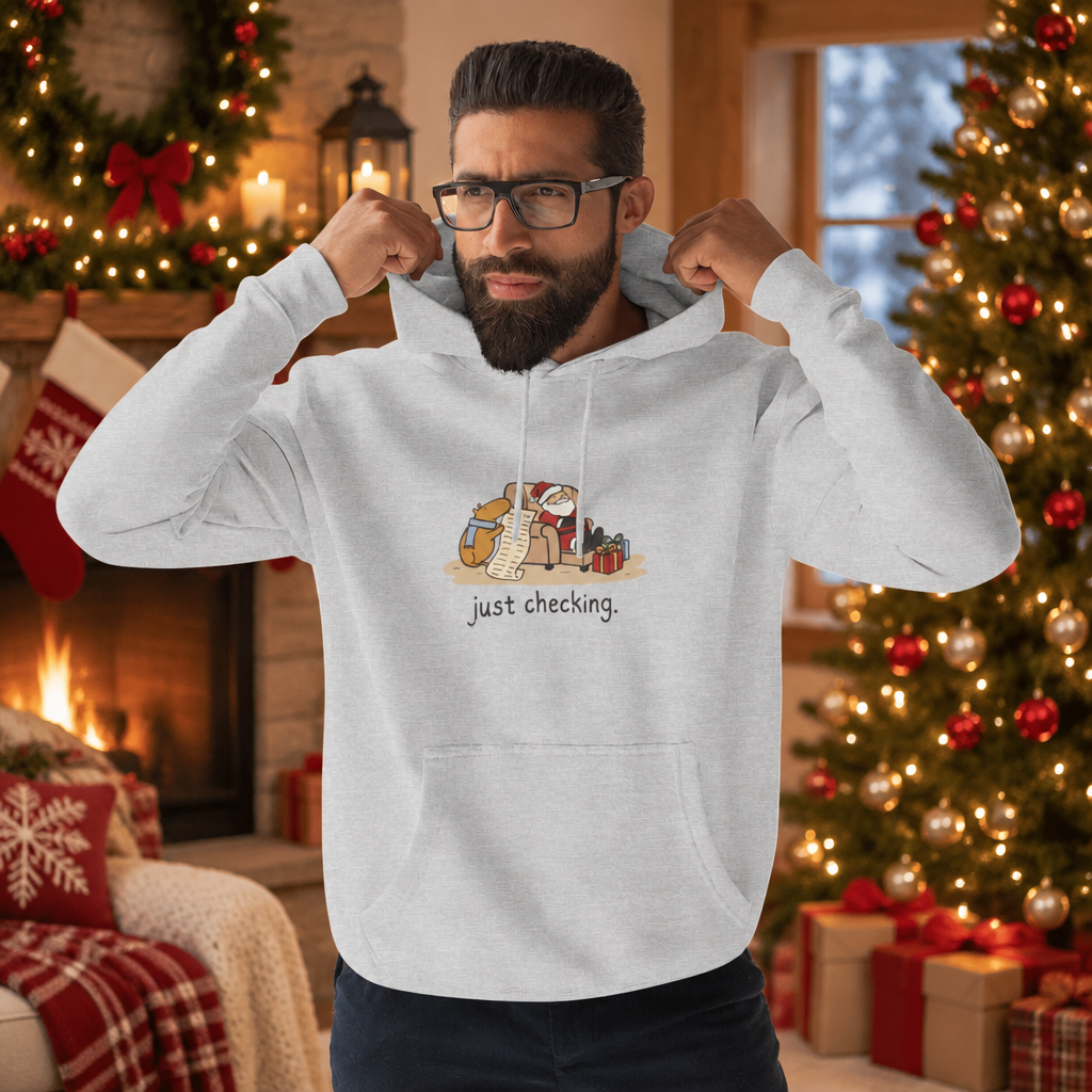 Capy Life grey fleece hoodie featuring a funny capybara illustration and the text just checking in a holiday setting