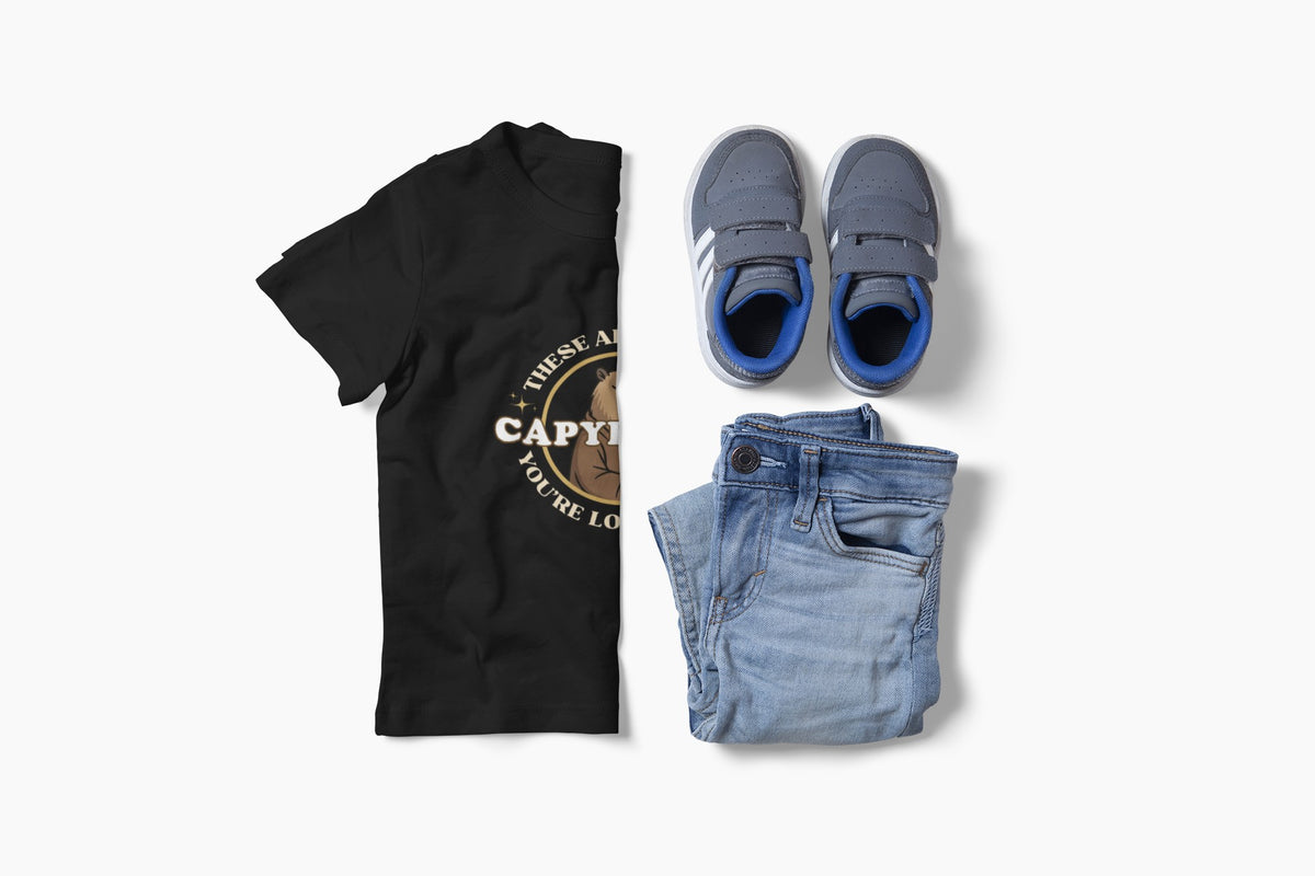 Capy Life youth black cotton t-shirt with Star Wars parody capybara graphic, paired with blue jeans and grey sneakers.