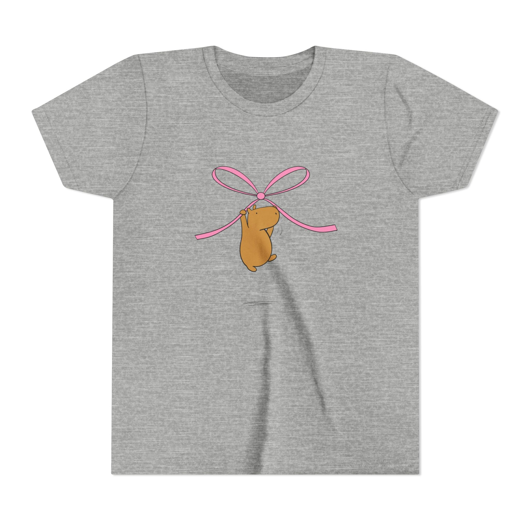 Capy Life kids heather grey t-shirt featuring a cute capybara hanging from a pink coquette bow graphic.