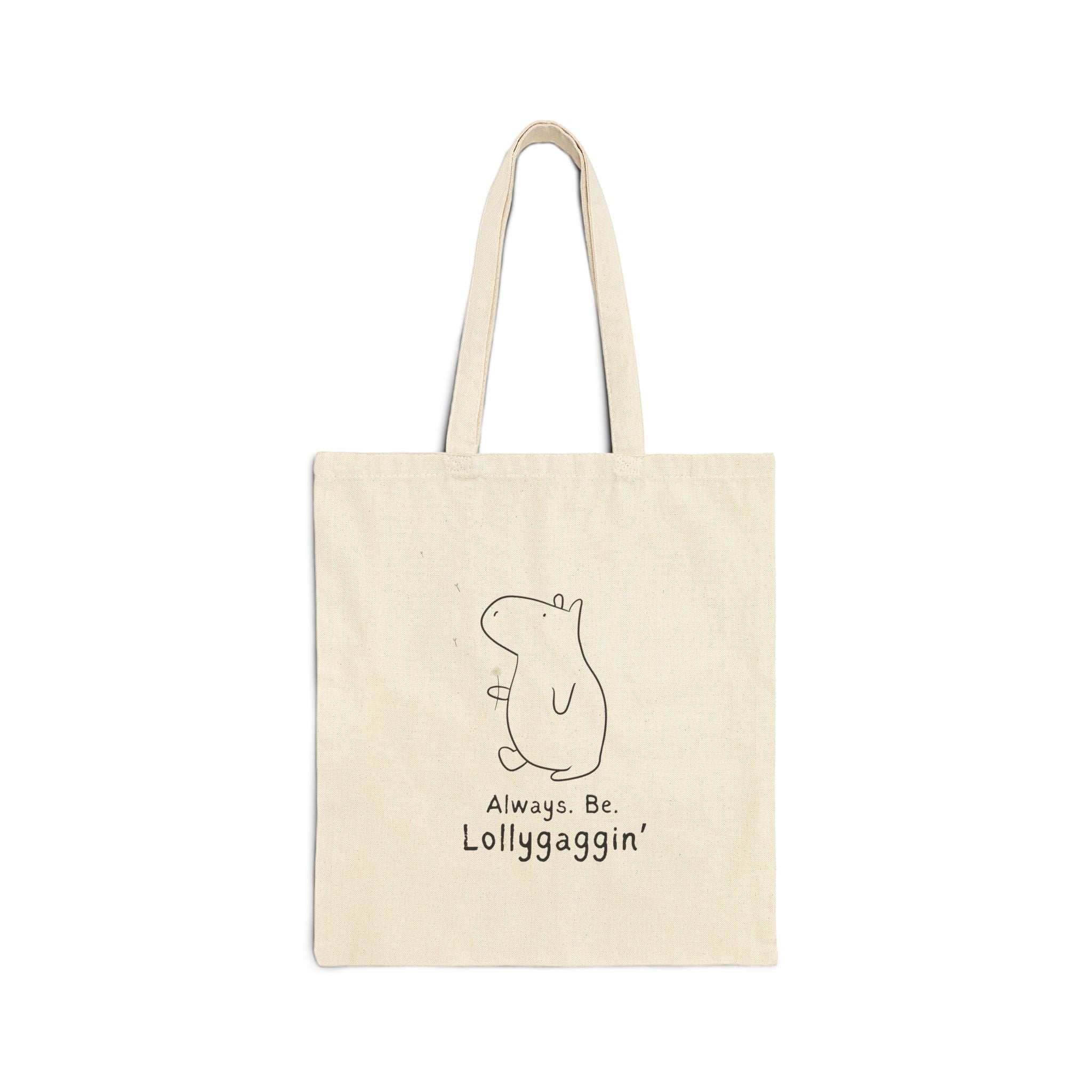 Capy Life natural canvas tote bag featuring a minimalist line drawing of a capybara and the text Always Be Lollygaggin