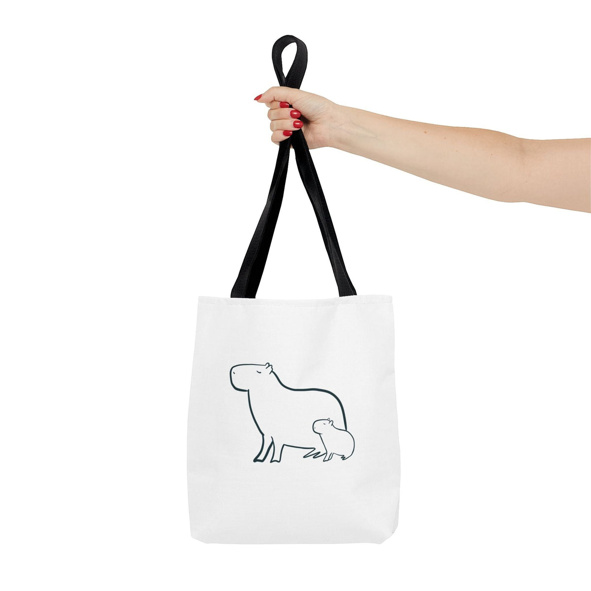 Capy Life minimalist white tote bag featuring a black line art illustration of a mother and baby capybara.