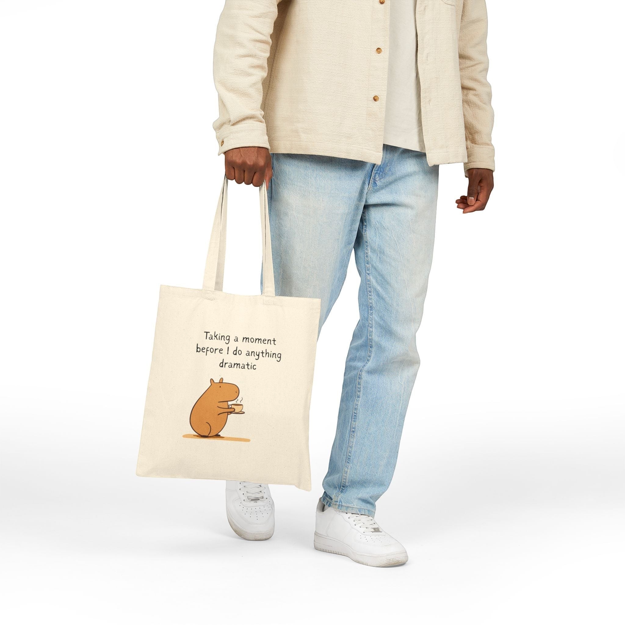 Capy Life natural cotton canvas tote bag featuring a capybara drinking coffee with the text Taking a moment
