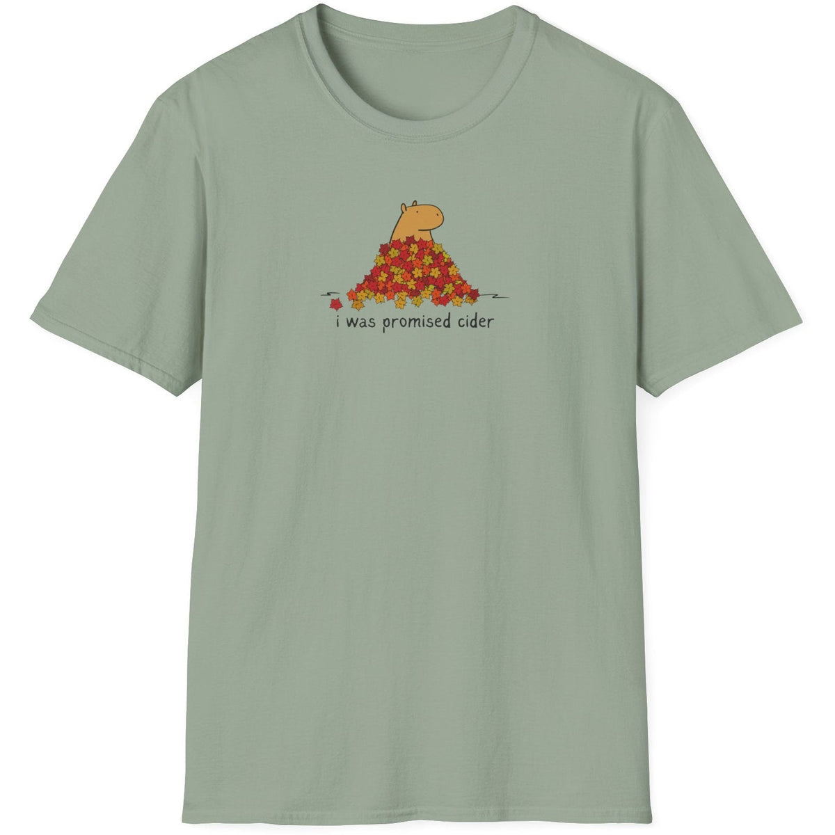 Capy Life sage green softstyle t-shirt featuring a capybara in autumn leaves with the text i was promised cider