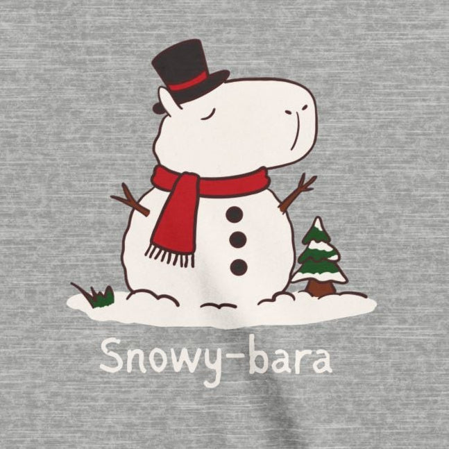 Capy Life kids t-shirt featuring a hand-drawn capybara snowman with a top hat, red scarf, and Snowy-bara text.