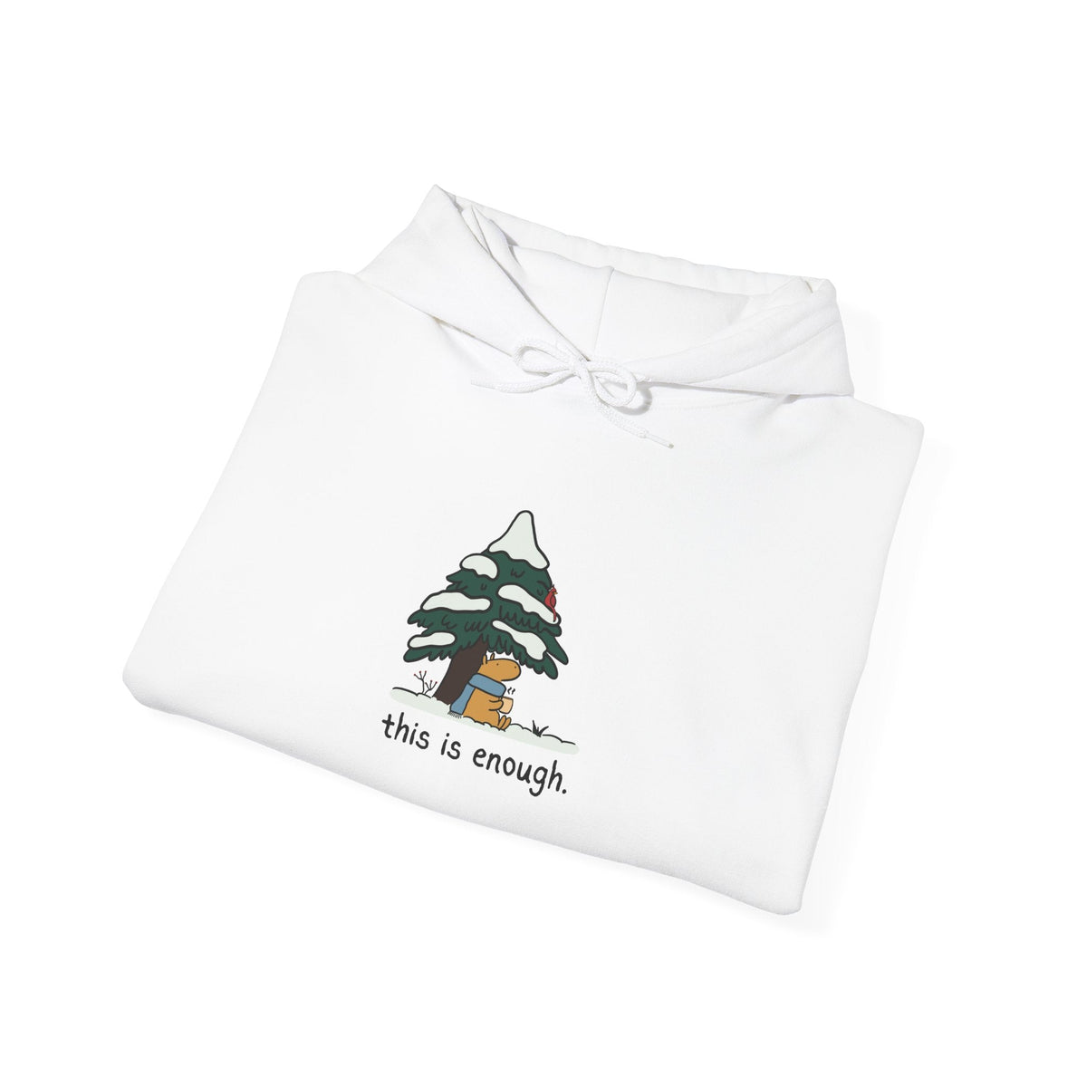 Capy Life white pullover hoodie featuring a hand-drawn capybara in a blue scarf under a snowy evergreen tree.
