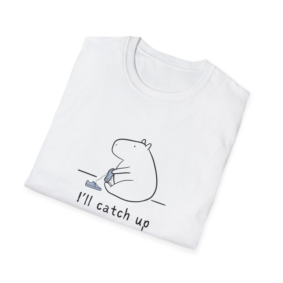 Capy Life white softstyle t-shirt featuring a minimalist graphic of a capybara tying its shoe with I'll catch up text