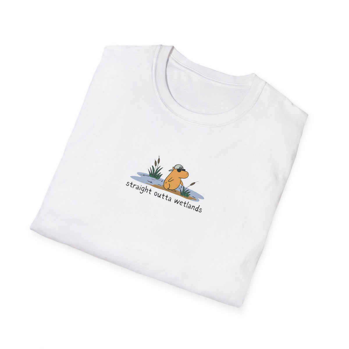 Capy Life white softstyle t-shirt featuring a small, hand-drawn capybara in a backwards hat with wetland cattails.