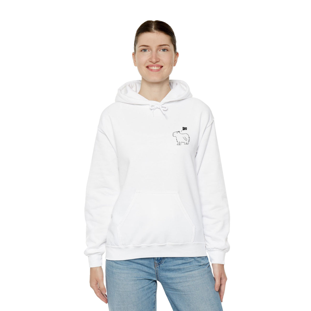 A woman wearing a white Capy Life hoodie with a minimalist embroidered capybara and the word Bro on the chest.