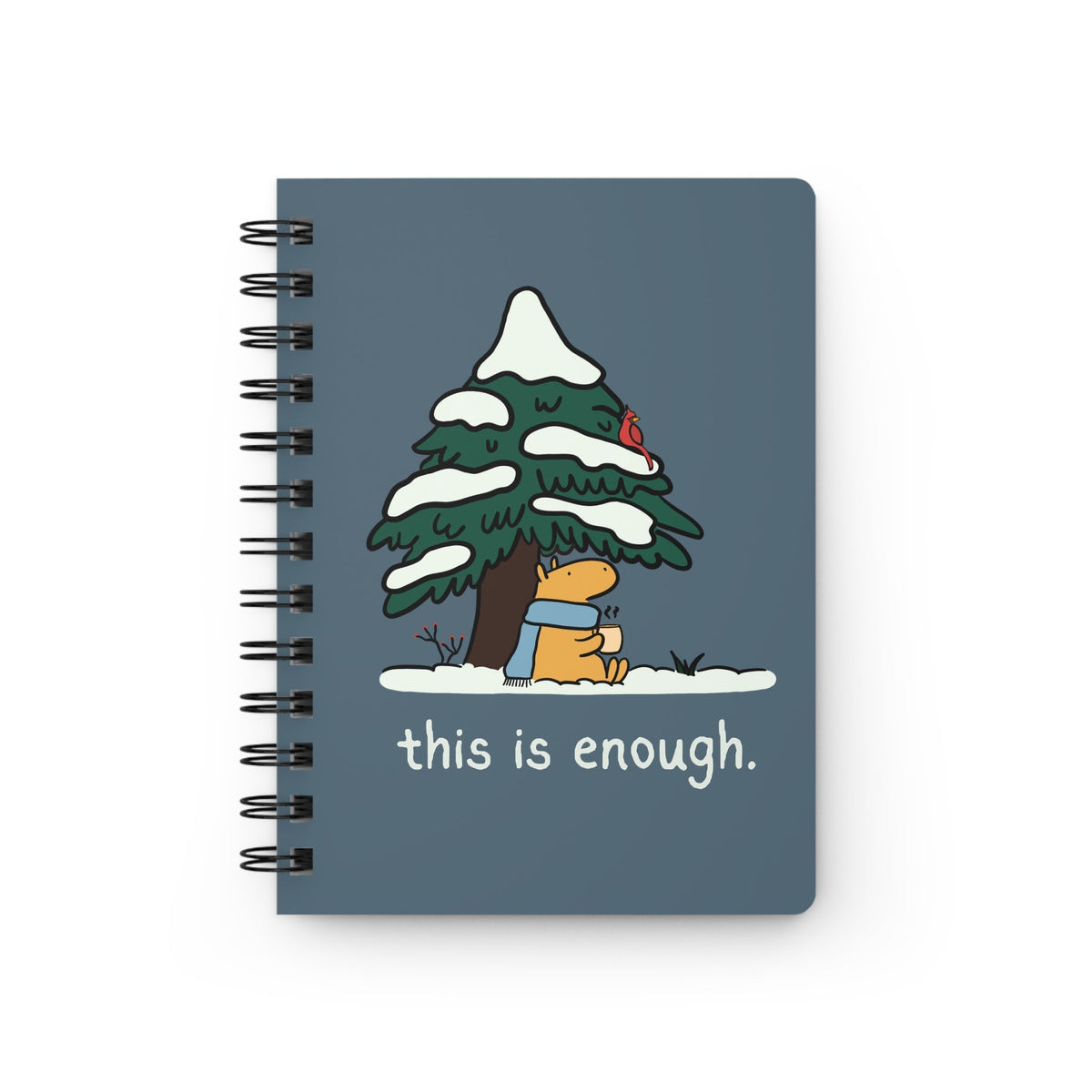 Capy Life spiral notebook with a blue cover featuring a capybara in a scarf under a snowy tree with a red cardinal.
