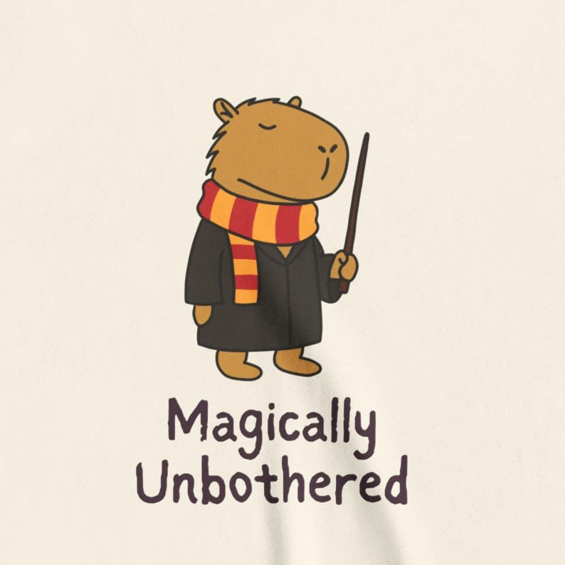 Capy Life youth tee graphic featuring a calm capybara wizard in a robe and scarf holding a wand with text below