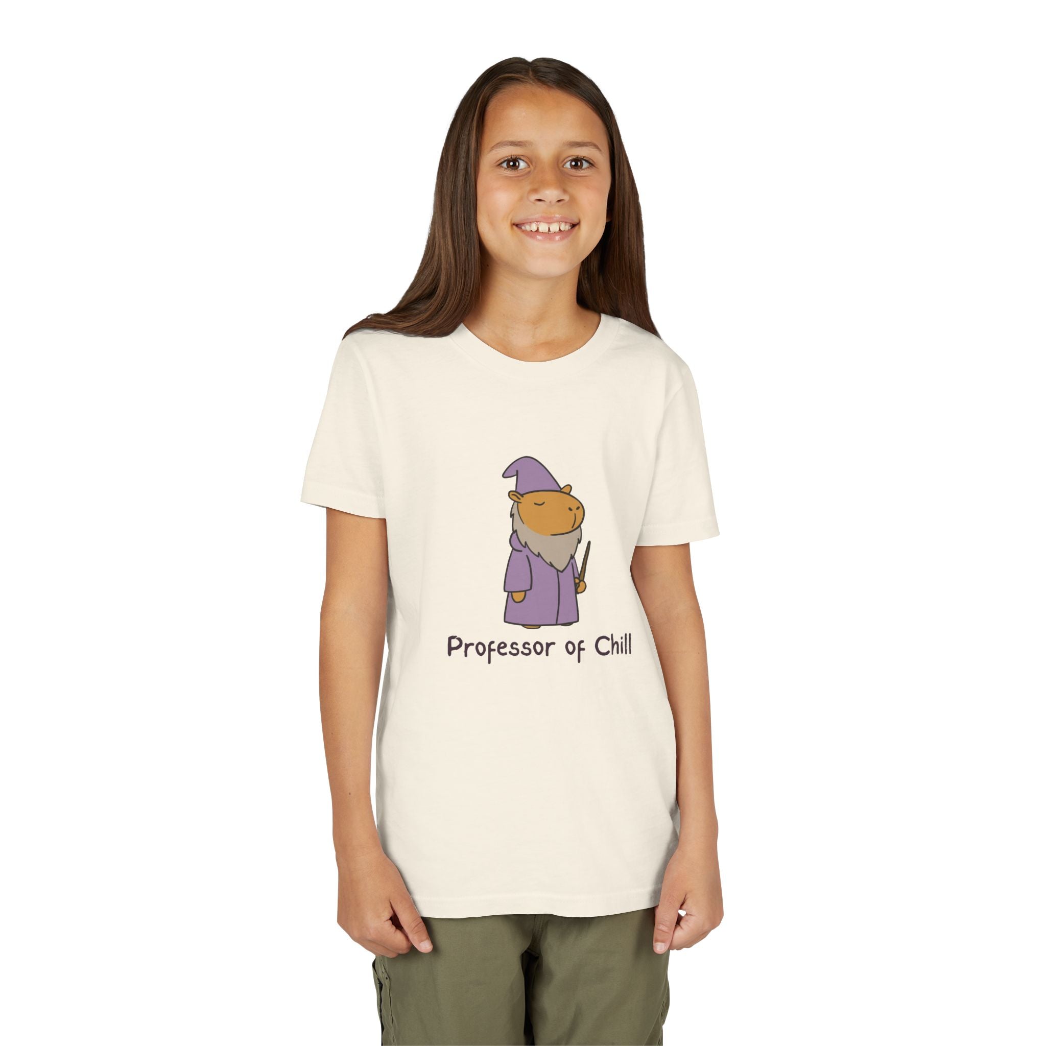 Capy Life youth tee featuring a wizard capybara in a purple robe with the text Professor of Chill on a cream shirt
