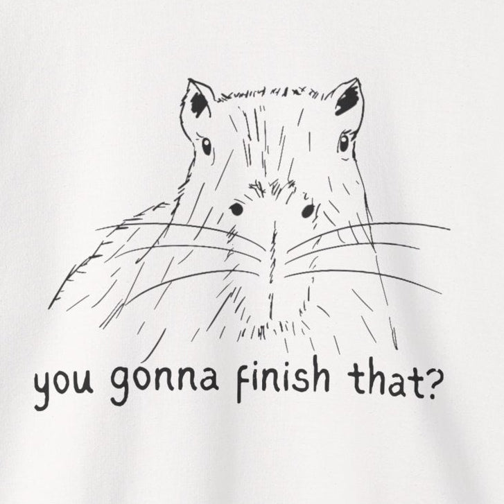 White sweatshirt with capybara design and text on a white background