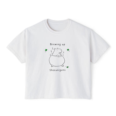 White t-shirt with line drawing of capybara and text "Brewing up Shenanigans