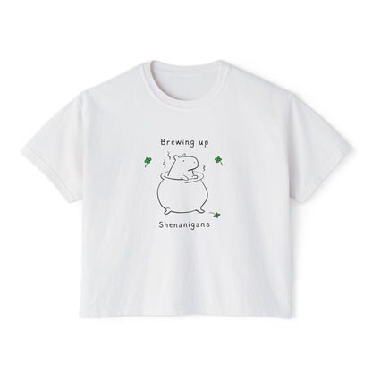 White t-shirt with line drawing of capybara and text "Brewing up Shenanigans