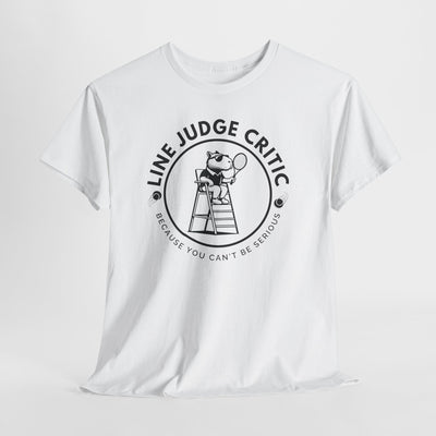White t-shirt with black line judge critic design featuring a cartoon capybara on a ladder holding a tennis racket