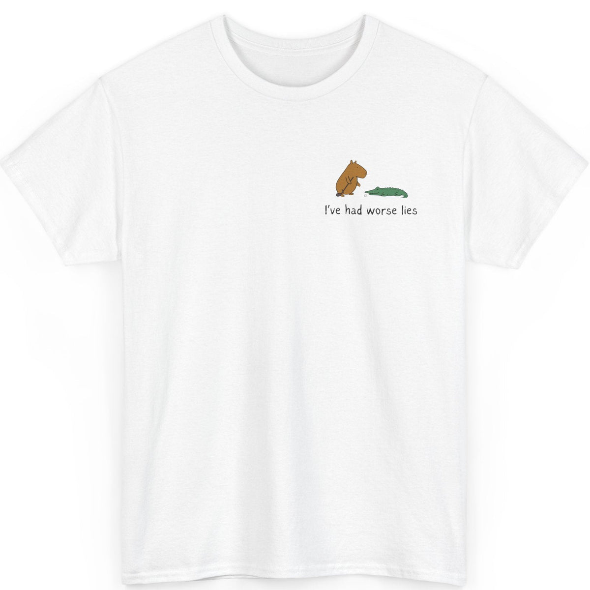 White t-shirt with a small capybara golfing next to an alligator and humorous golf text on a white background