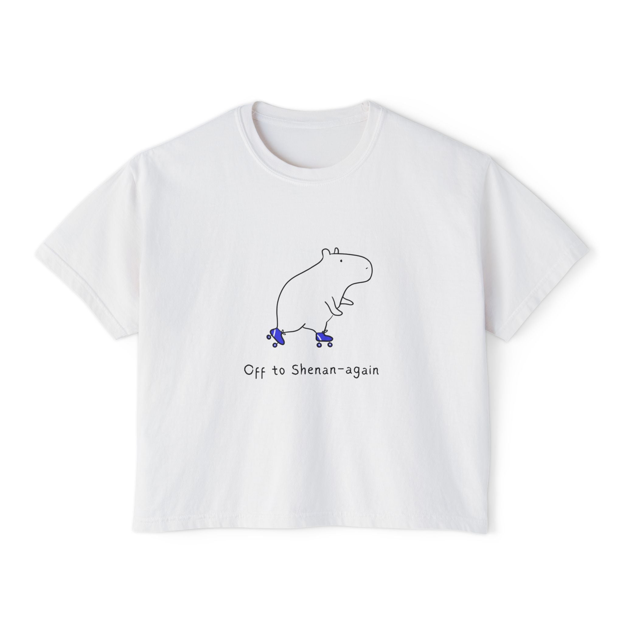 White boxy t-shirt with illustration of a hippo on roller skates and text "Off to Shenan-again