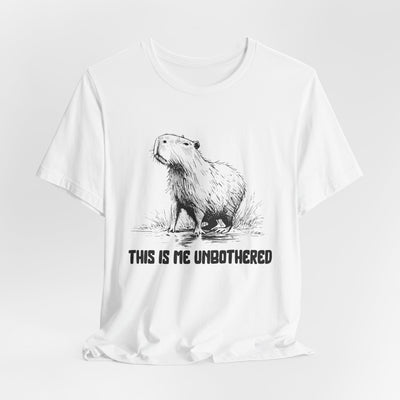 White t-shirt with black-and-white illustration of an otter and the text "This Is Me Unbothered".