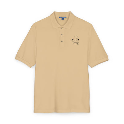 Beige polo shirt with embroidered capybara cartoon image and text-free design