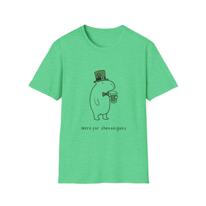 Green t-shirt with a cartoon capybara wearing a leprechaun hat and holding a beer, text "Here for shenanigans