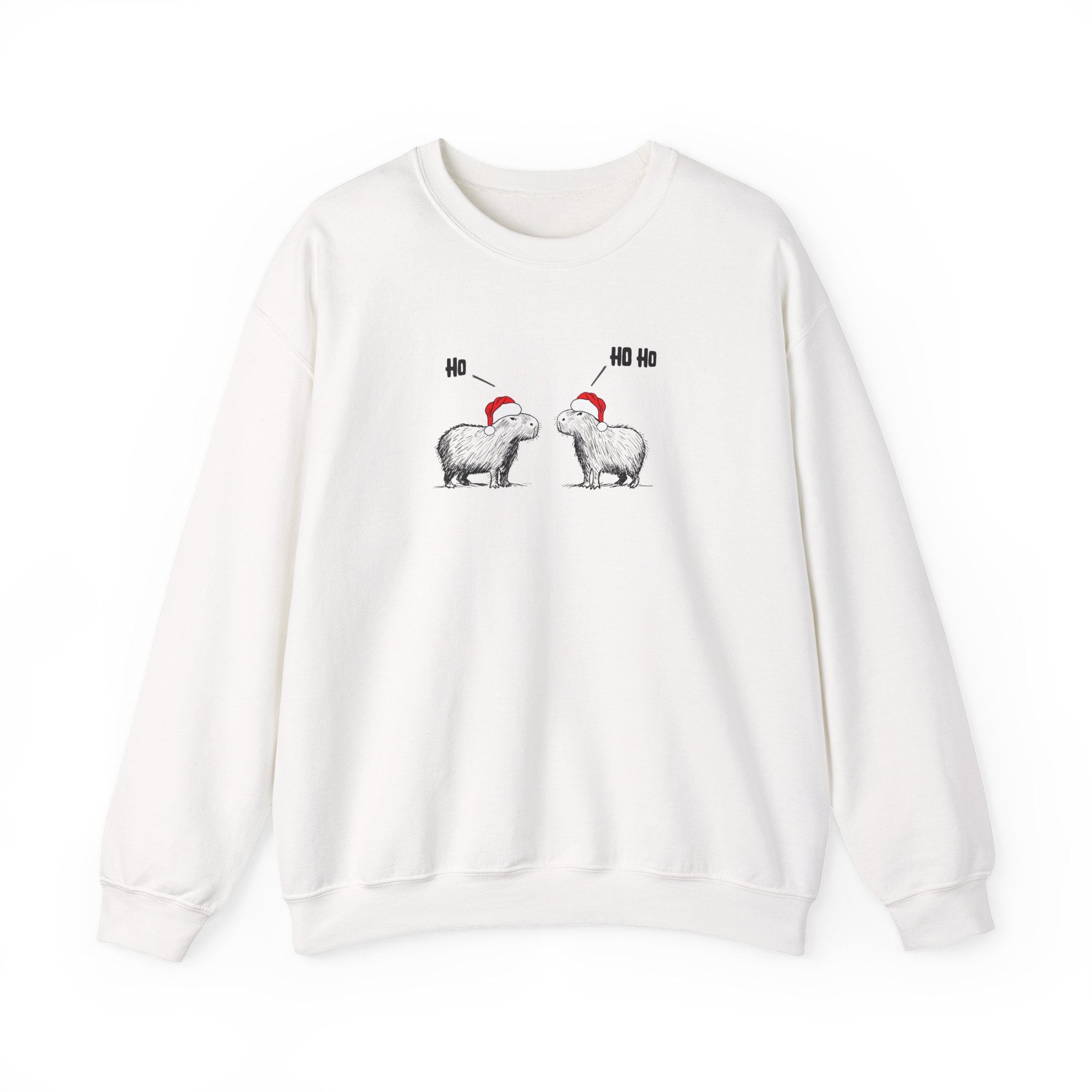 White crewneck sweatshirt featuring a graphic of two capybaras wearing red Santa hats facing each other with 'HO HO HO' text above them