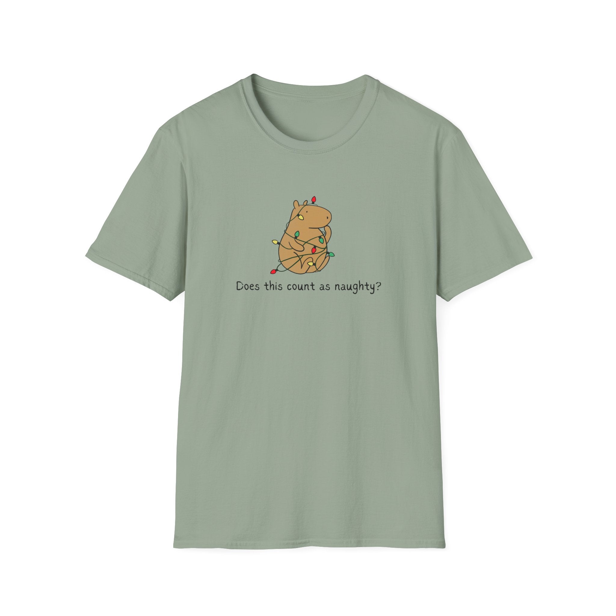Sage  t-shirt with a capybara tangled in christmas lights and the humorous phrase "Does this count as naughty?"