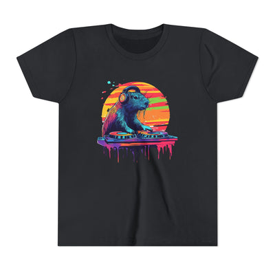Colorful illustration of a capybara wearing headphones and using DJ equipment against a sunset background, printed on a black unisex t-shirt.