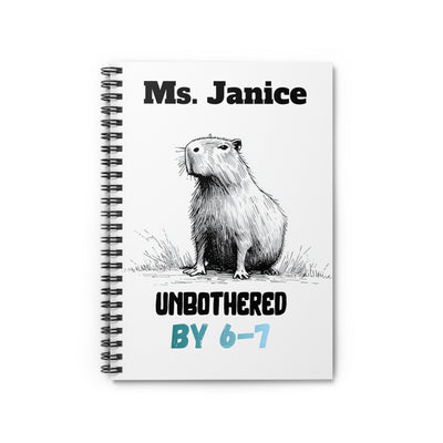 A spiral-bound notebook with a black and white sketch of a cute otter and the text "Ms. Janice Unbothered by 6-7" on a white background.