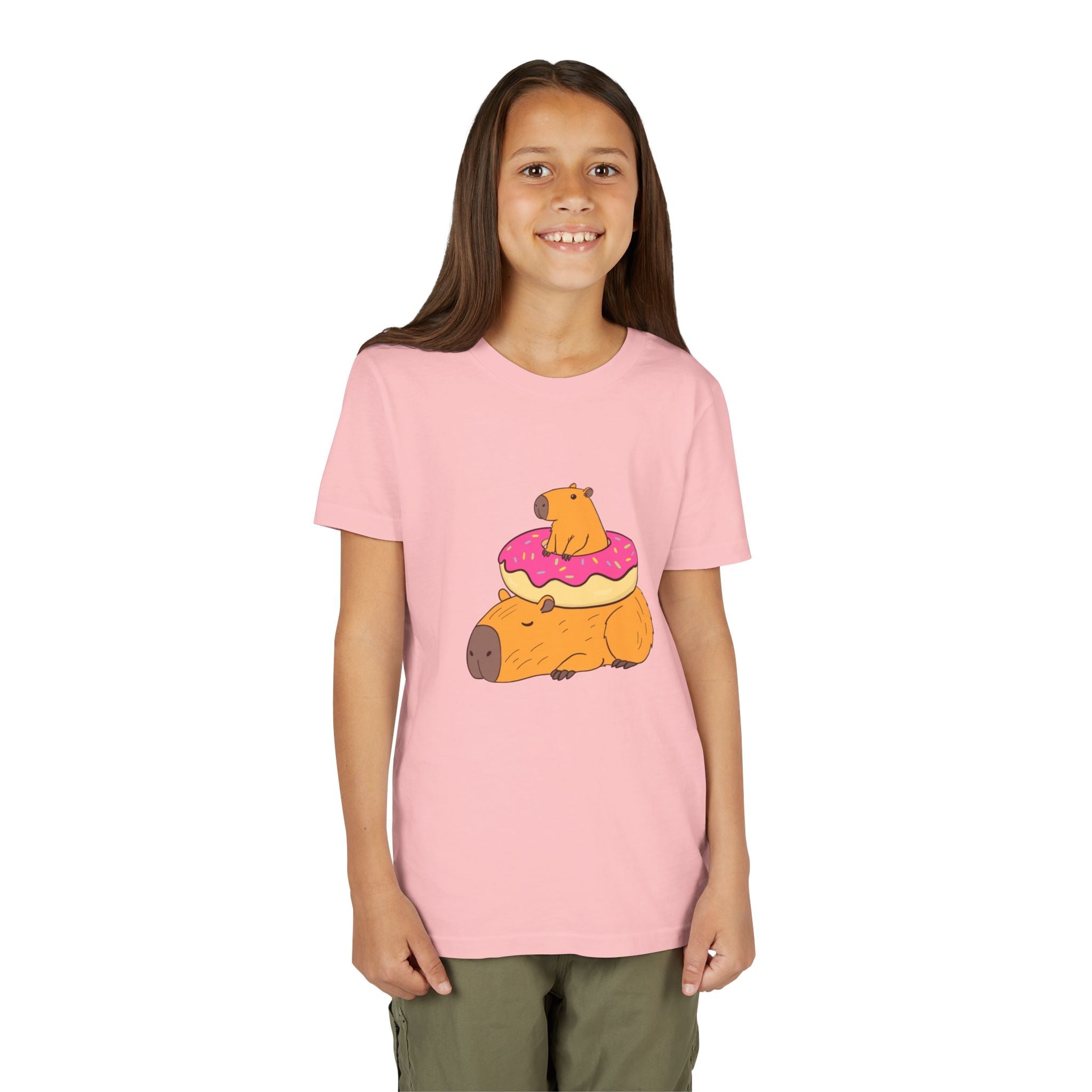 Capy Life youth pink cotton t-shirt featuring a cute graphic of two capybaras and a pink donut on the front