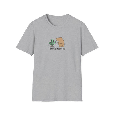 Gray short-sleeve crewneck t-shirt featuring a cute graphic of a small green cactus and a brown capybara with the text 'i should touch it.' printed on the chest, displayed against a solid white background.