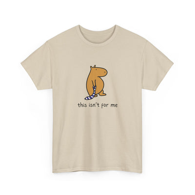 Beige t-shirt with a graphic of a capybara and text 'this isn't for me' on a neutral background