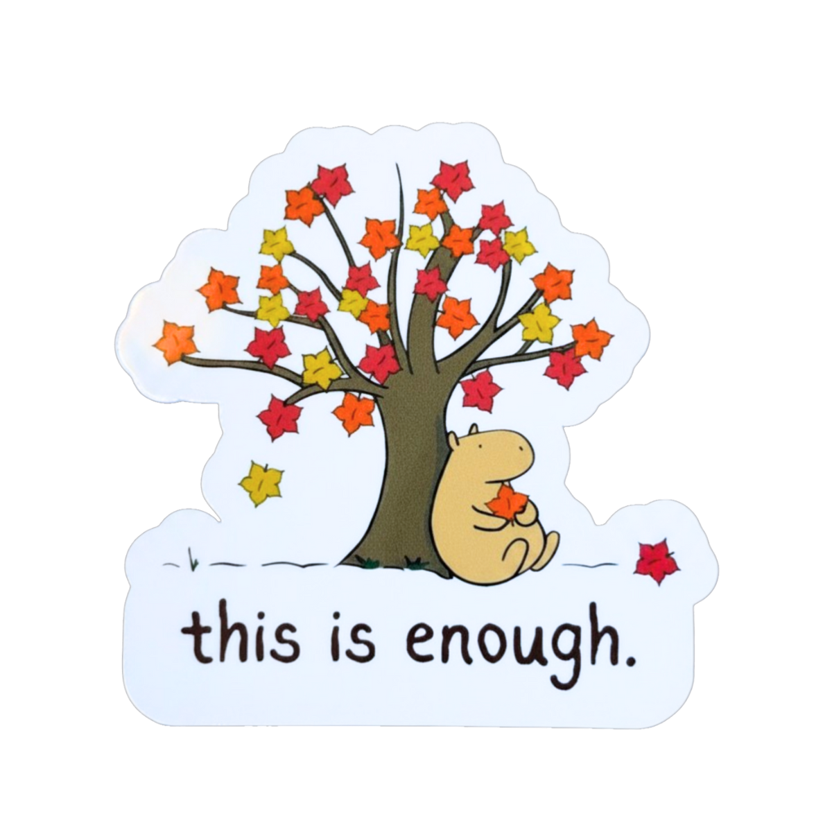 Capy Life die-cut sticker featuring a cute capybara sitting under an autumn tree with the text this is enough.